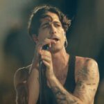 Damiano David sul palco del Palazzo dello Sport di Roma, durante il tour Funny Little Fears